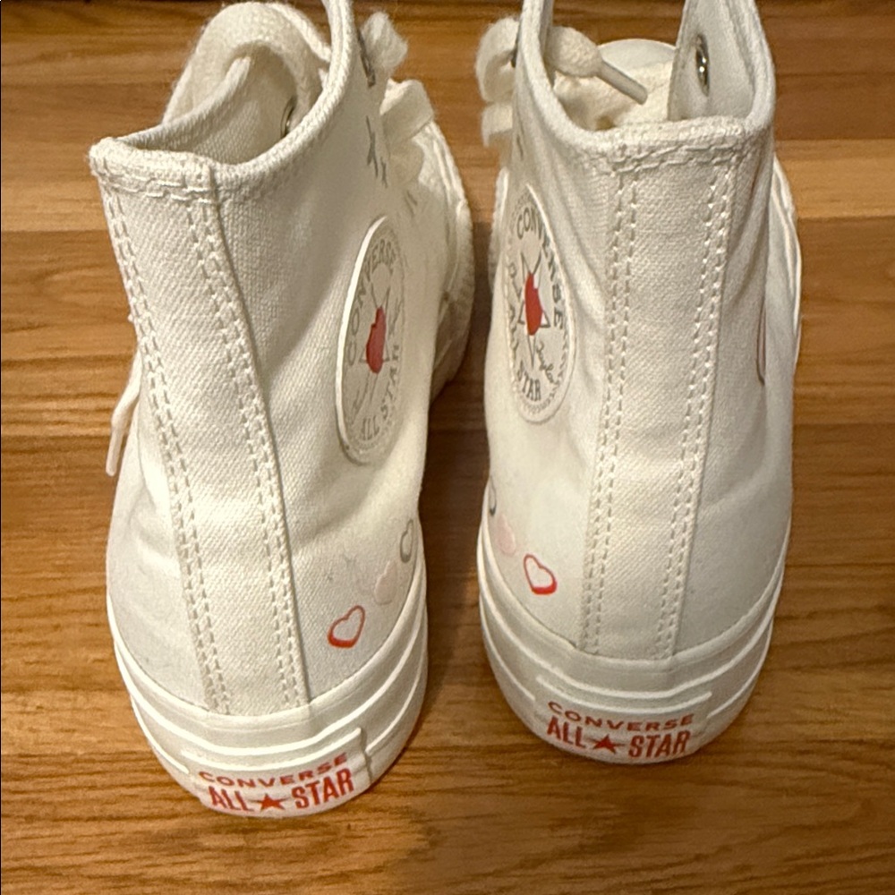 Converse White High Top Sneakers with Red Accents